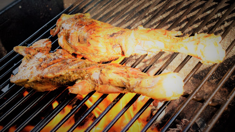 _DSC6355 (2) Goat legs grilling over wood fire