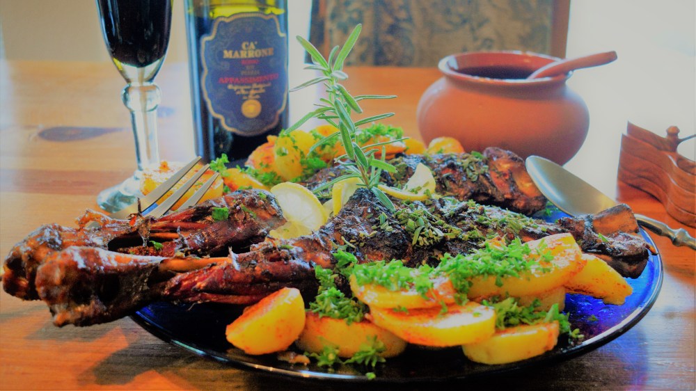 _DSC6361 (2) Grilled Goat Leg on platter with Paprika Parsley Potatoes